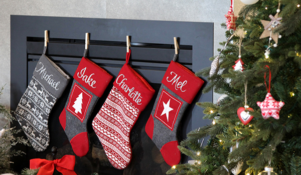 Christmas stockings - Pesonalised stockings hanging in a fireplace