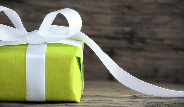 Unique Ideas for Exchanging Christmas Gifts - Yellow green gift box with white ribbon