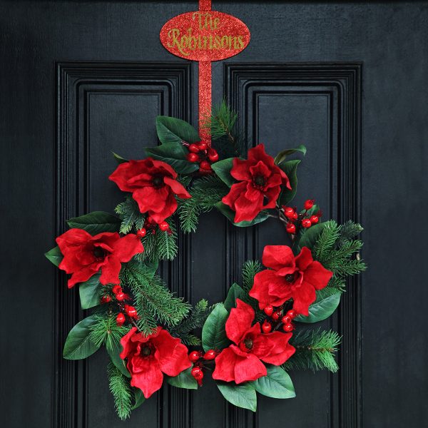 deluxe red magnolia christmas wreath on black doo - Christmas in July Decorating Ideas: Beyond the Table and the Tree
