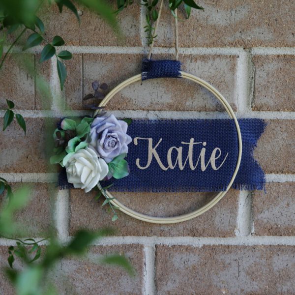 Personalised Midnight Blue Small Floral Embroidery Hoop Wreath Hanging in a Wall