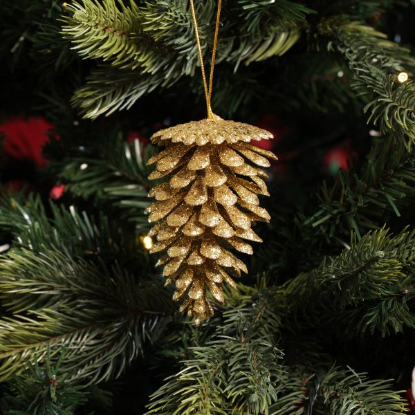 A Christmas Kitchen Gold Glitter Faux Pinecones Hanging in a Christmas Tree