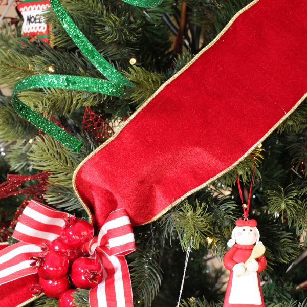 A Christmas Kitchen Red Velvet Wired Ribbon Garland Placed in a Christmas Tree