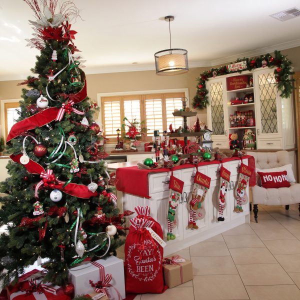 A Christmas Kitchen Room 4 with a Big Christmas Tree and gifts, santa sacks