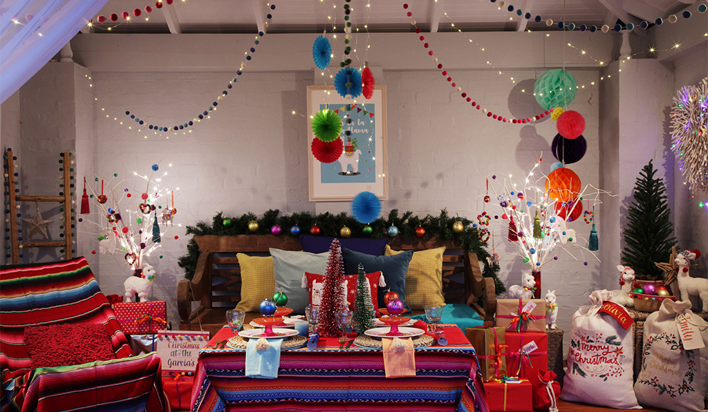 Falalala Llama Christmas Fiesta Night room filled with different colours