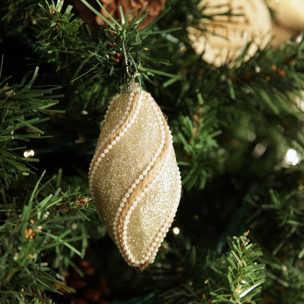 Gold Twist Bauble Drop Hanging in a Christmas Tree