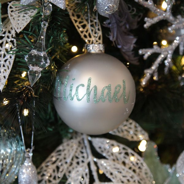 Personalised Silver Bauble hanging in a christmas tree