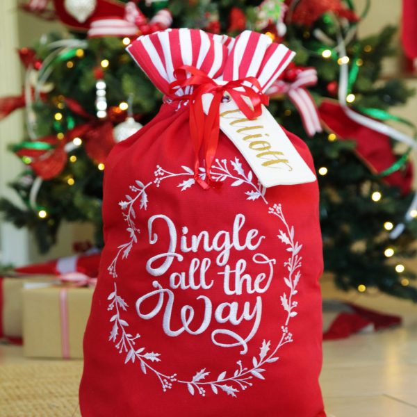 Personalised 'Jingle All The Way' Santa Sack with a tag Named Elliot