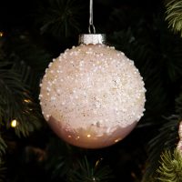 Pink Snow Bead Glass Ball Hanging in a christmas tree
