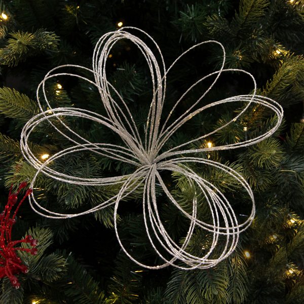 deluxe silver beaded flower placed in a Christmas tree