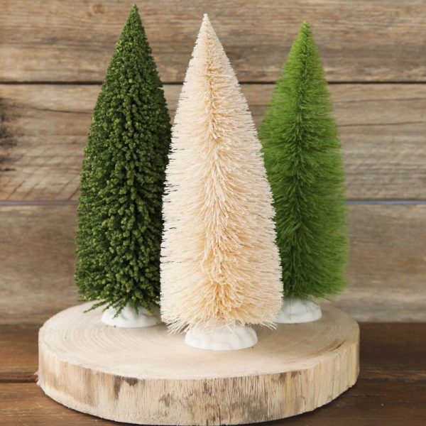 Bush Christmas Small Ivory and Green Bottle Brush Tree Set of 2 placed on a round wooden decor behind is a wooden background