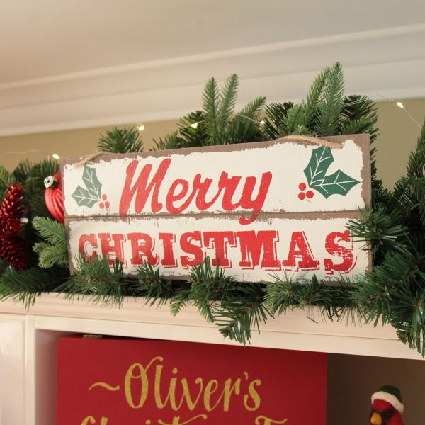 A Christmas Kitchen Merry Christmas Wooden Christmas Sign Placed on top of the cabinet
