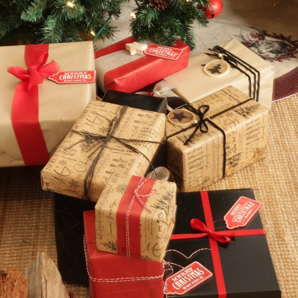 Farmhouse Christmas Presents placed under a christmas tree