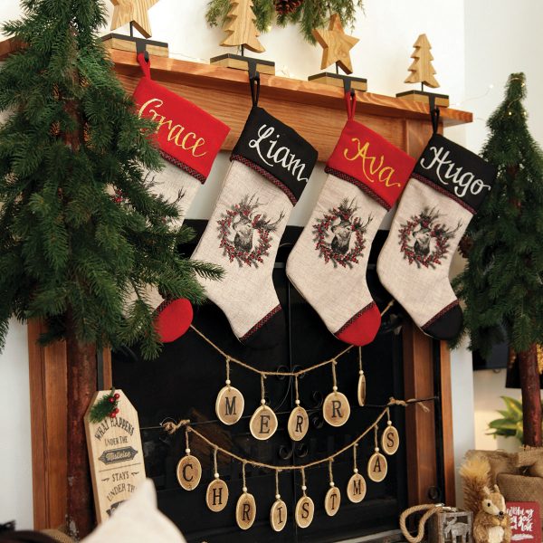 Farmhouse Christmas Stockings Hanging infront of a Fireplace