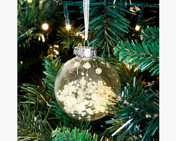 Craft Bauble with little pearl inside hanging in a Christmas Tree