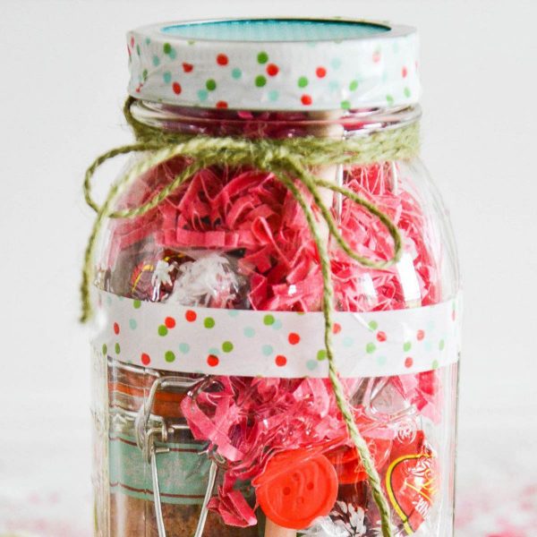 Mason Jar filled with different accessories inside