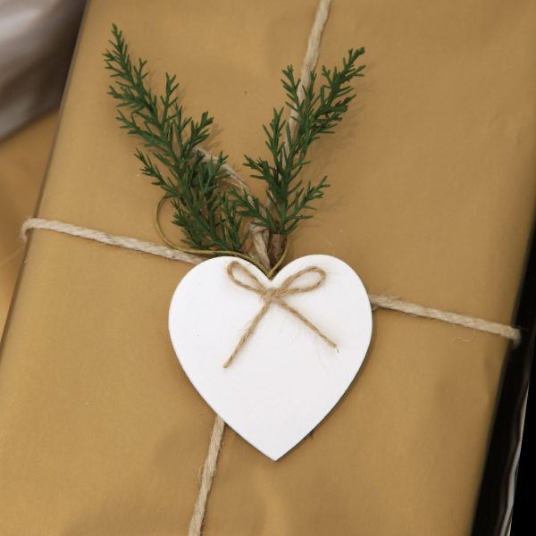 Gold and WHite Christmas Gifts Wrapped with Brown Wrapping and Heart Design with Leaf
