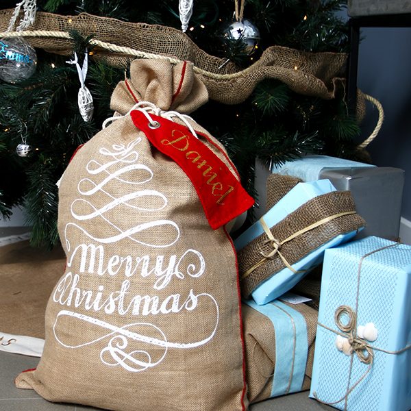 Lifestyle Hamptons - Christmas Sacks with Merry Christmas Print and Gifts Beside