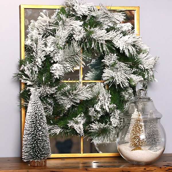 Mixed Metal Lifestyle - Christmas wreath with table top tree and a Glass jar with mini trees ans artificial snow