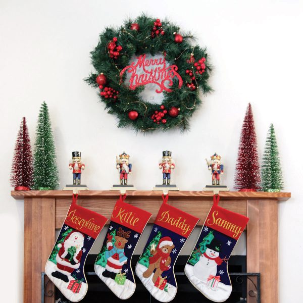 Magical Morning Christmas with Personalised Christmas Stockings Hanging in a Fireplace and Merry Christmas Wreath