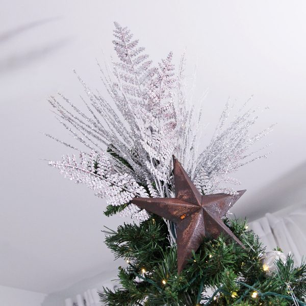 Elegant Christmas Tree Topper with Bronze Star placed