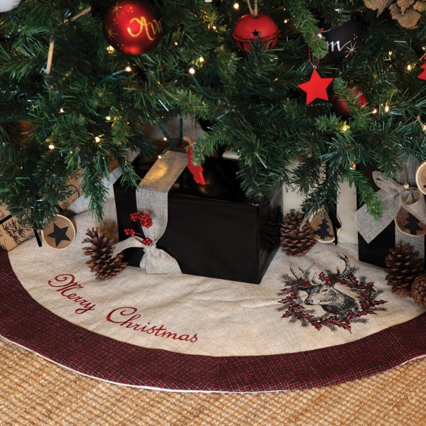 Christmas Tree Skirt under a Christmas Tree with a wrapped Christmas Present