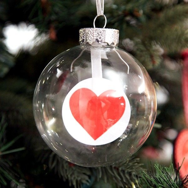 Craft Bauble with Heart Hanging in a Christmas Tree