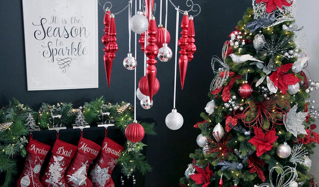 It is the Season to Sparkle Poster Downnload Hanging in a Wall with Personalised Christmas Stockings and a Christmas tree with Decorations