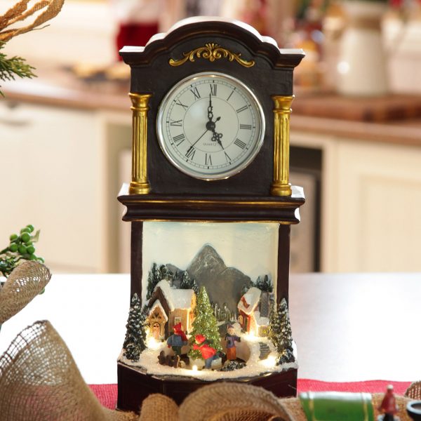 A Christmas Kitchen Grandfather Clock Lightup Ornament with Ice Skaters
