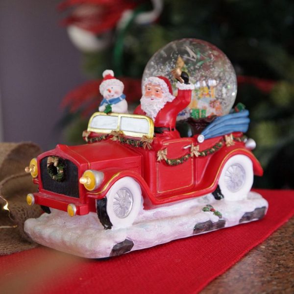 A Christmas Kitchen Santa in Car Snowglobe