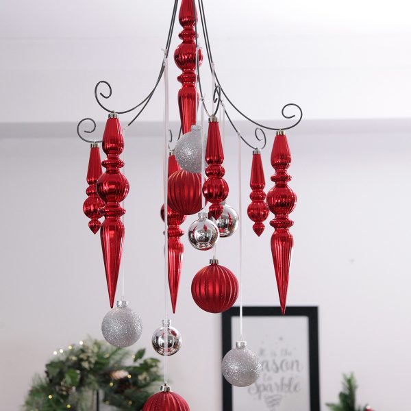 Red Chandellier Hanging in the Living room with Silver and Baubles Hanging