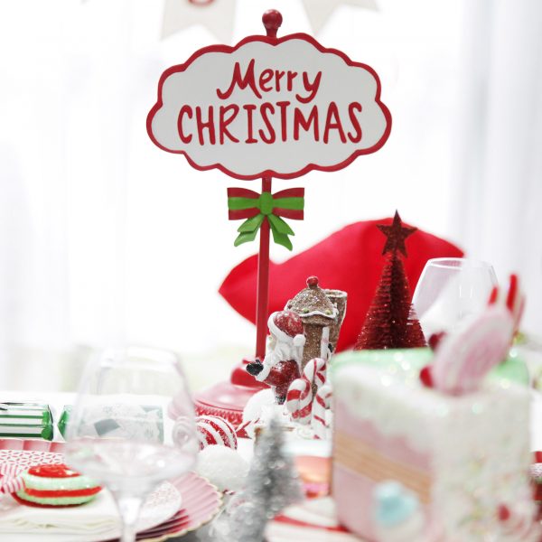 Peppermint Candy Christmas Red Merry Christmas Standing Sign Ornament Placed in a table