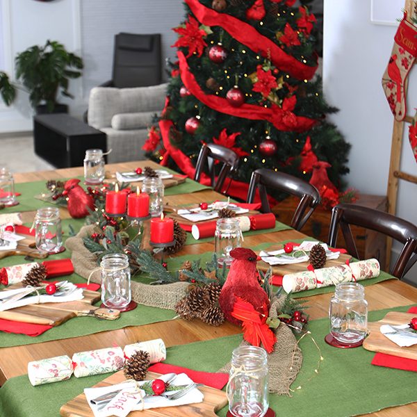 Rustic Table Setting with Pinecones and Red Cardinal Bird Ornament