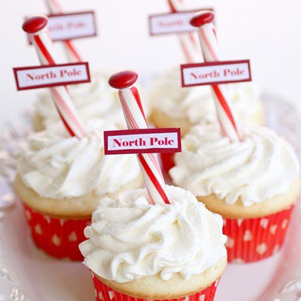 Christmas Cupcakes white Icing and Candle with North pole sign