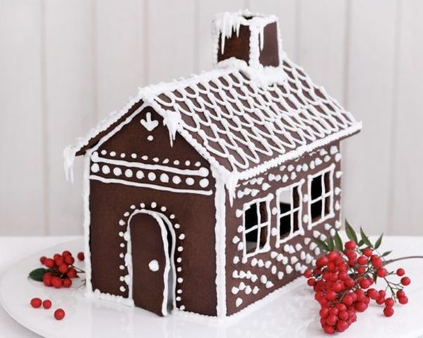 Chocolate Gingerbread House with Red Berry Beside