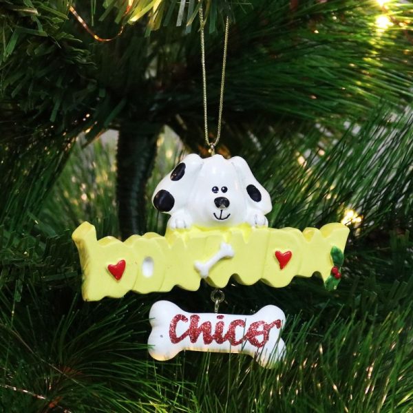 Dog Bow Wow Ornament with Bone Name Chicer Hanging in a Christmas Tree