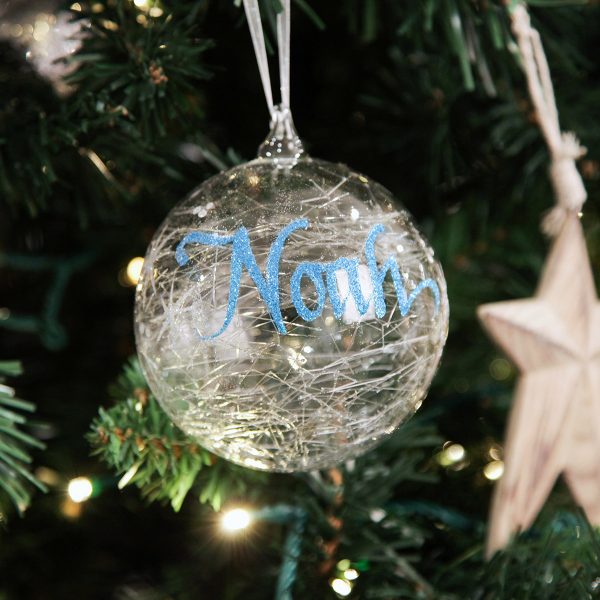 Personalised Icicle Chrismtas Bauble Hanging on a Christmas Tree Named Noah