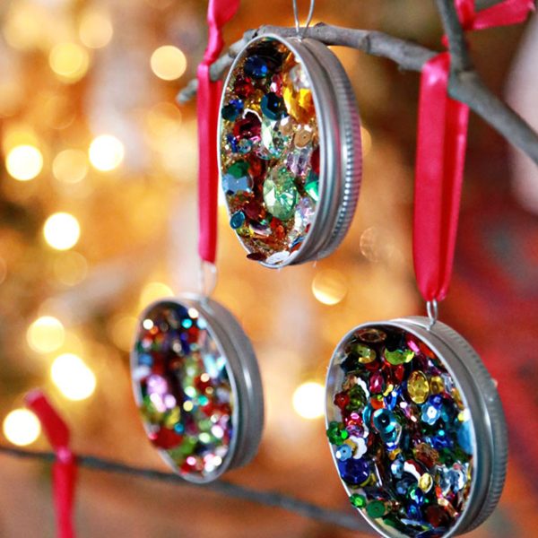 Lid Ornaments with Glitters Hanging in a Branch