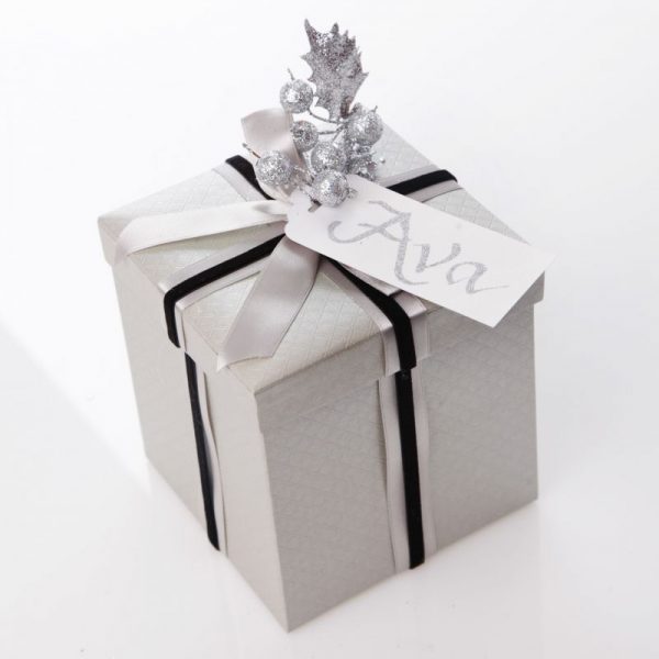 Scalloped Gift Tag Named Ava Wrapped in a Silver Metalic Gift Box