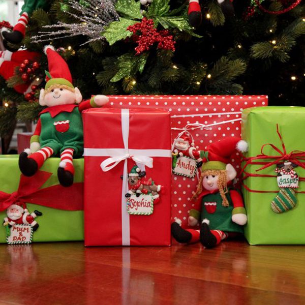 Santas Little Helper Presents under the Christmas Tree