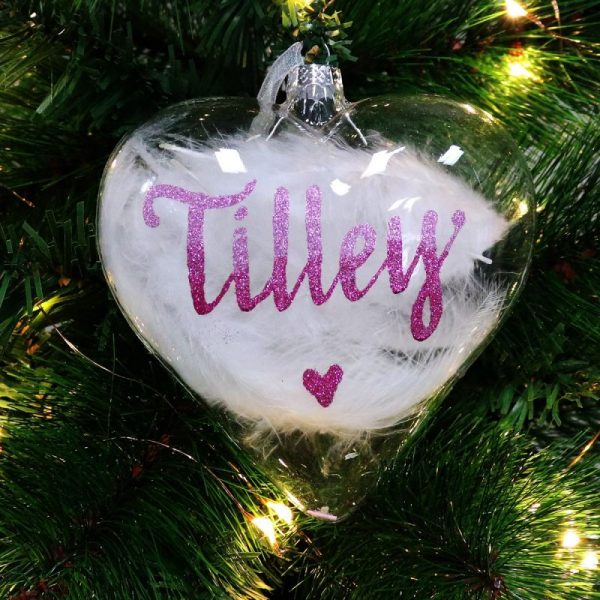 White Feather Glass Heart Hanging in a Christmas Tree