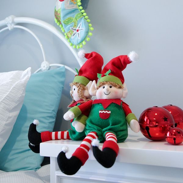 Girl and Boy Elf Sitting in the Bedside Table