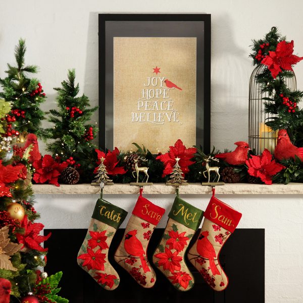 Burlap bells and birds with Personalised Christmas Stockings Hanging in the Fire Place