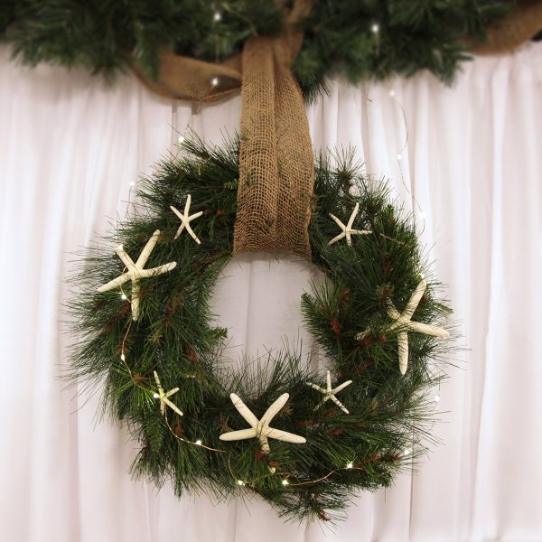Coastal Majestic Christmas Wreath Hanging in a Brown Mesh