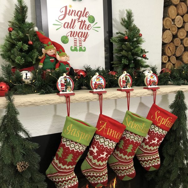 Red And Green Knitted Stockings Mantle and a Personalised Christmas Stockings with Stocking Holder