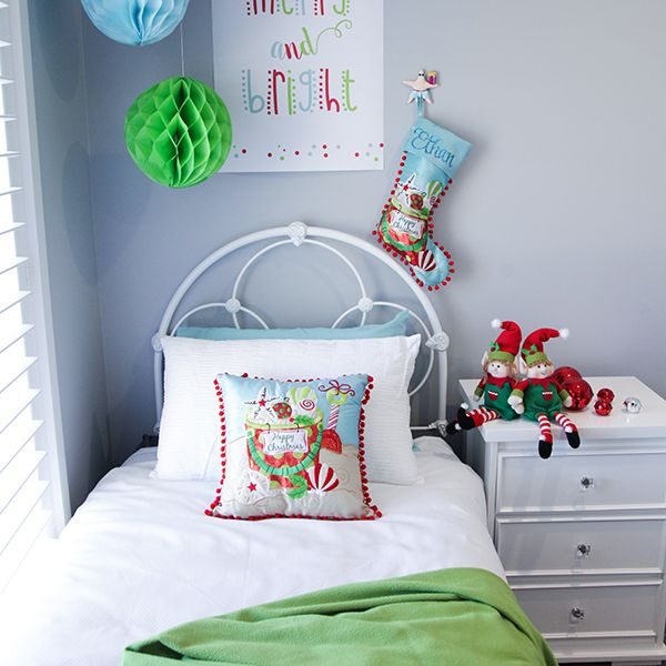 Boy Starfish Cusion Placed in a Single bed with Personalised Pom Pom Beach Christmas Stocking Hanging