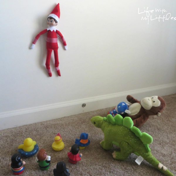 Elf taped Up by other toys in the Living room