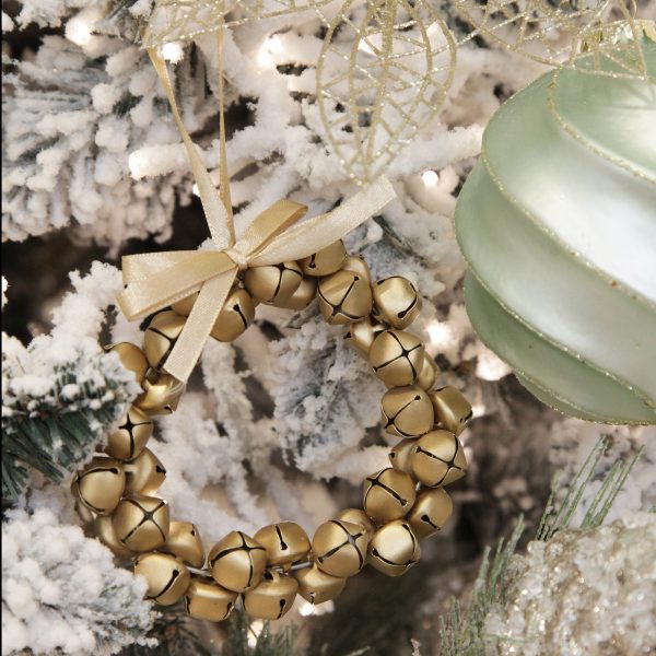 Christmas Joy Brass Bell Wreath Decoration Hanging in A Christmas Tree