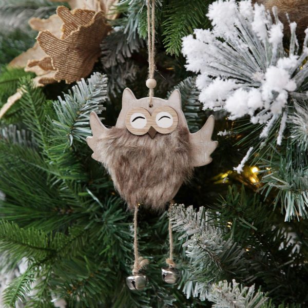 Wood Owl Hanger with Fur and Bells hanging in a christmas tree