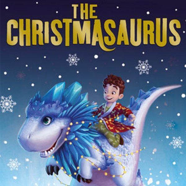 Christmas Eve Box Ideas for the Whole Family - A boy riding a snow dinosaur while snowing