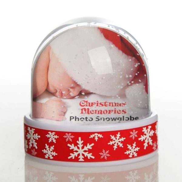Photo Snow Dome - Red Snowflakes with a sleeping baby wearing Santa red hat